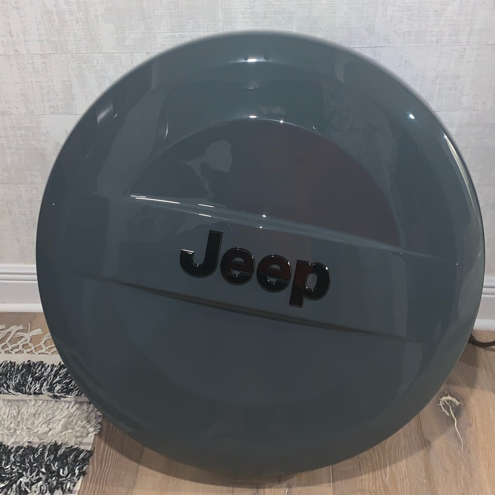 jeep wrangler wheel cover until 2018 model.